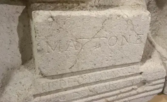 The panel inscribed “Mattone” carved into the Pietra delle misure, with lines of text below